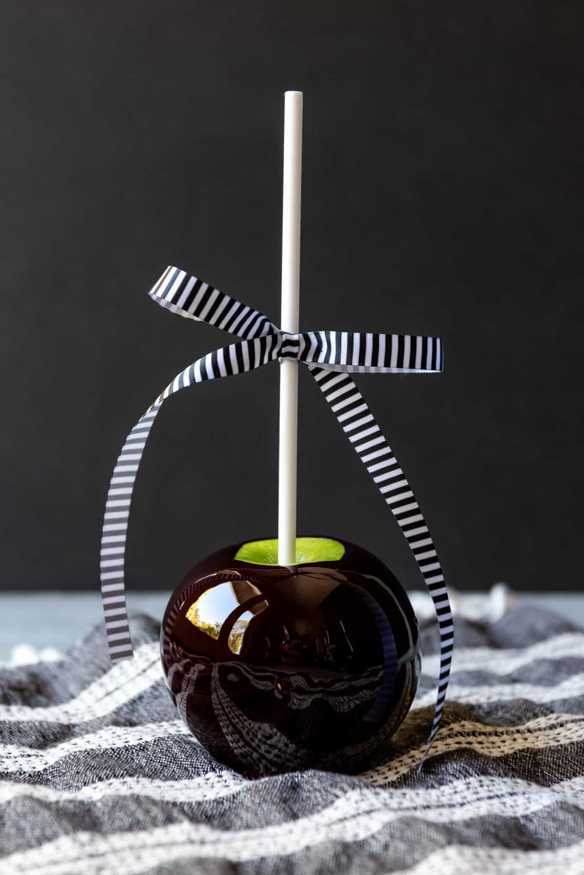 An image of a black poison apple.