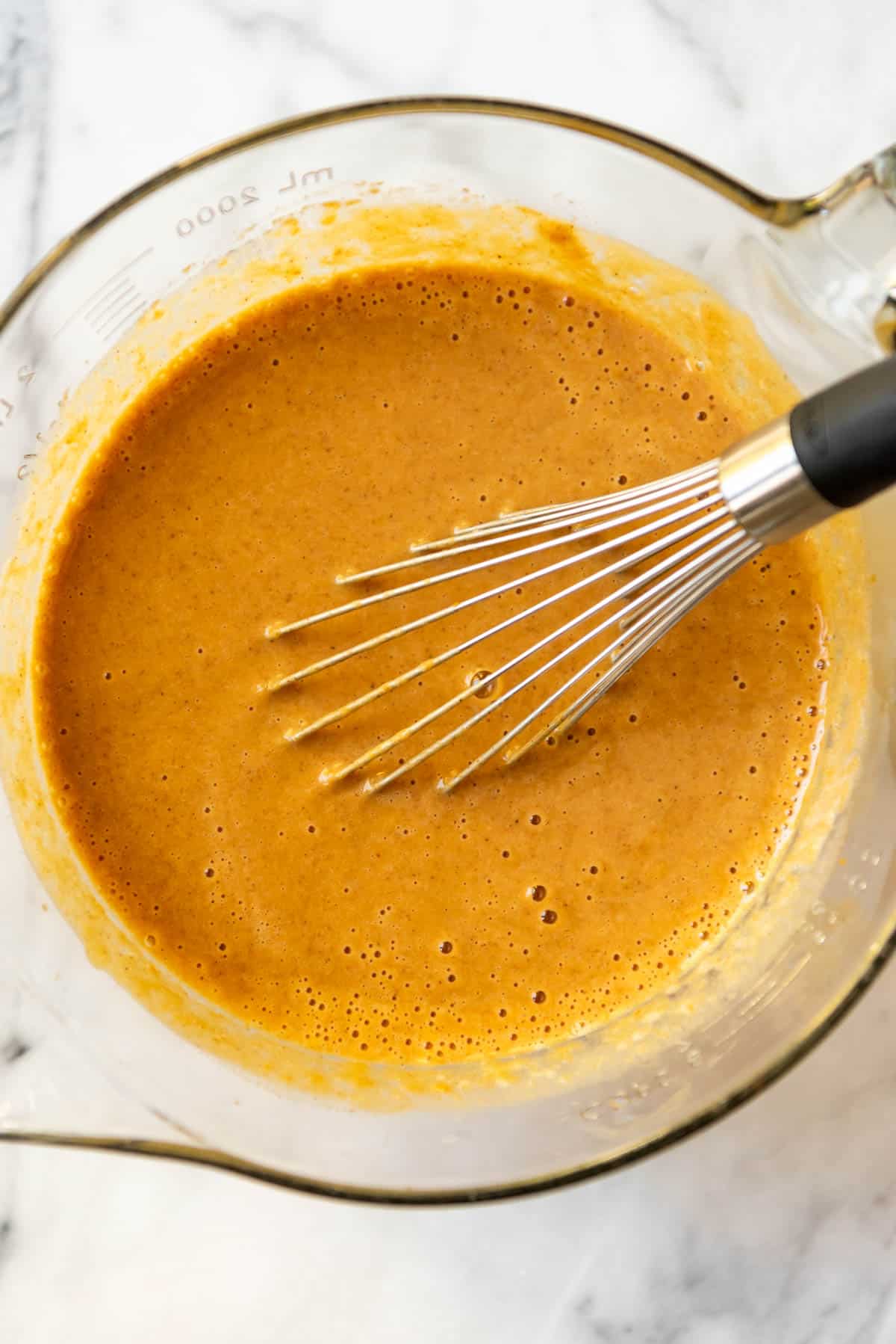 Pumpkin pie filling ready to go into a pie crust.