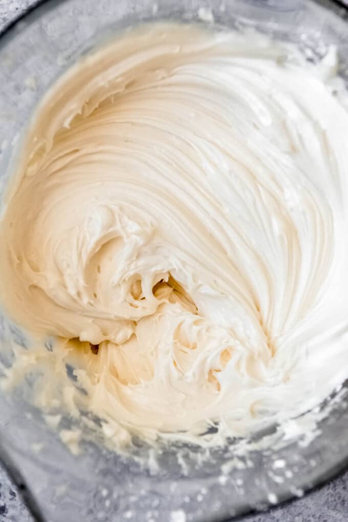 Cream cheese frosting for pumpkin cookies.
