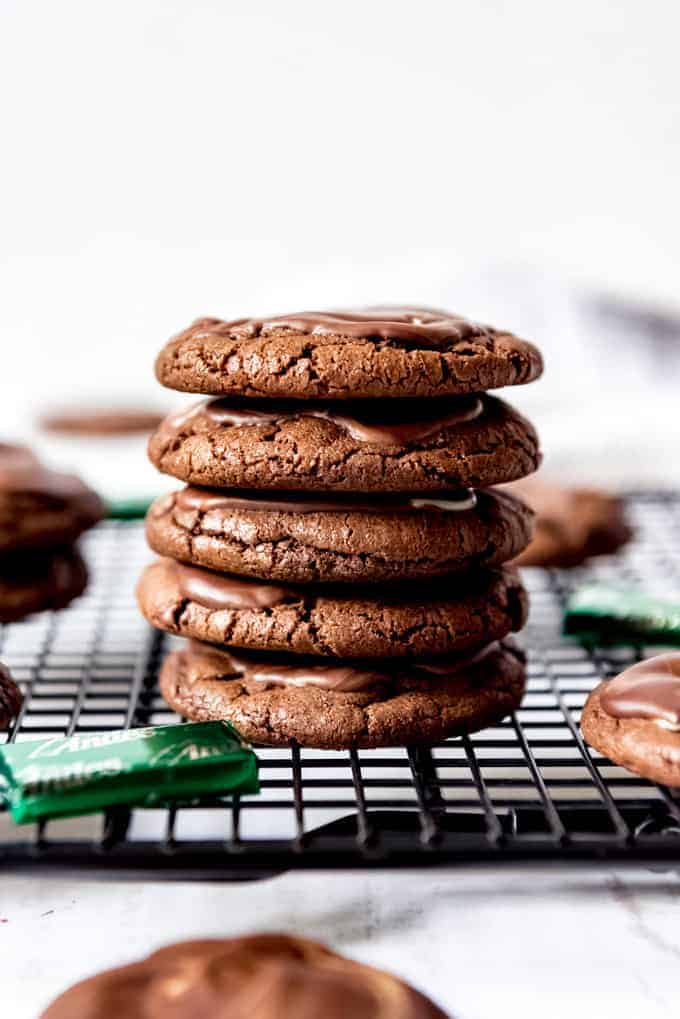 An image of a stack of soft chocolate mint cookies.