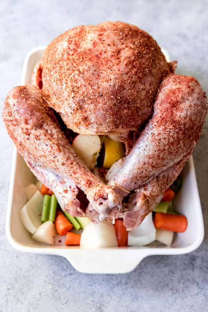 An image of a turkey that is stuffed and trussed for roasting.
