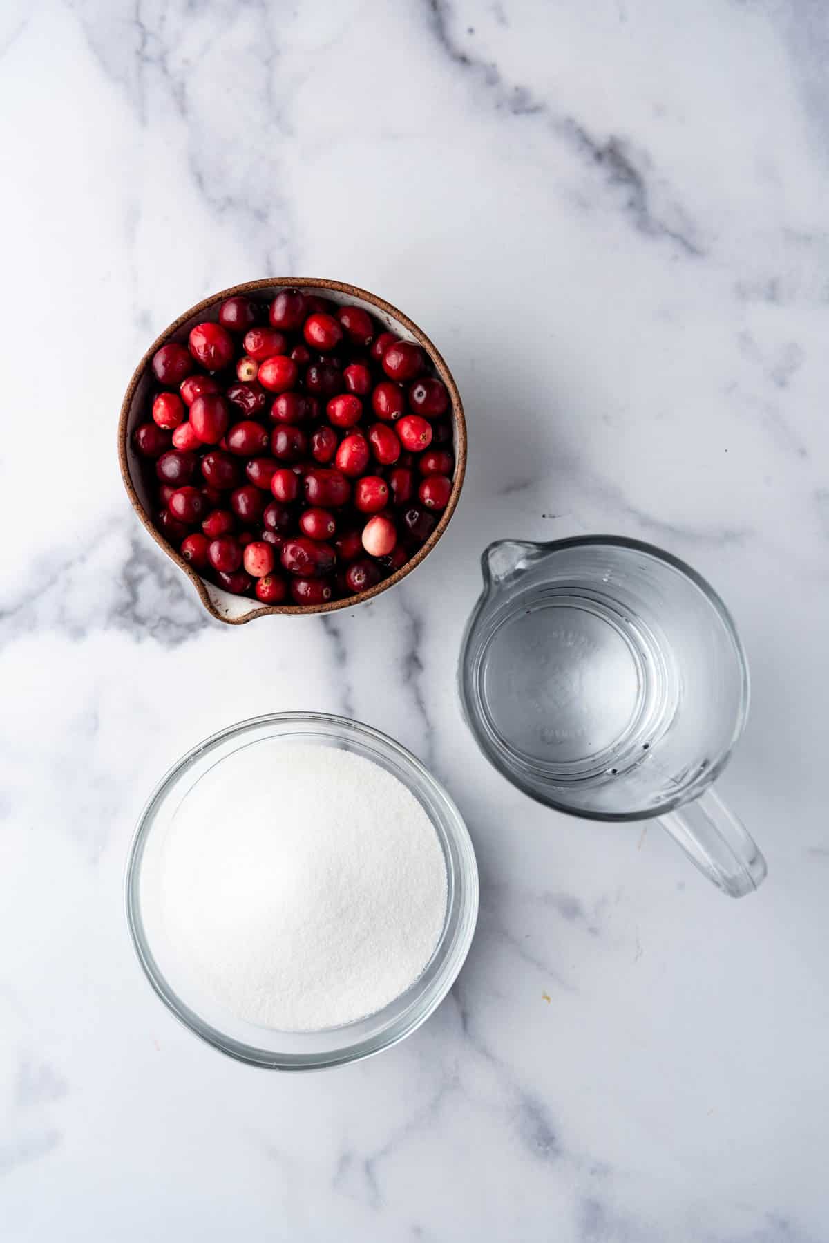 Ingredients for making sugared cranberries.