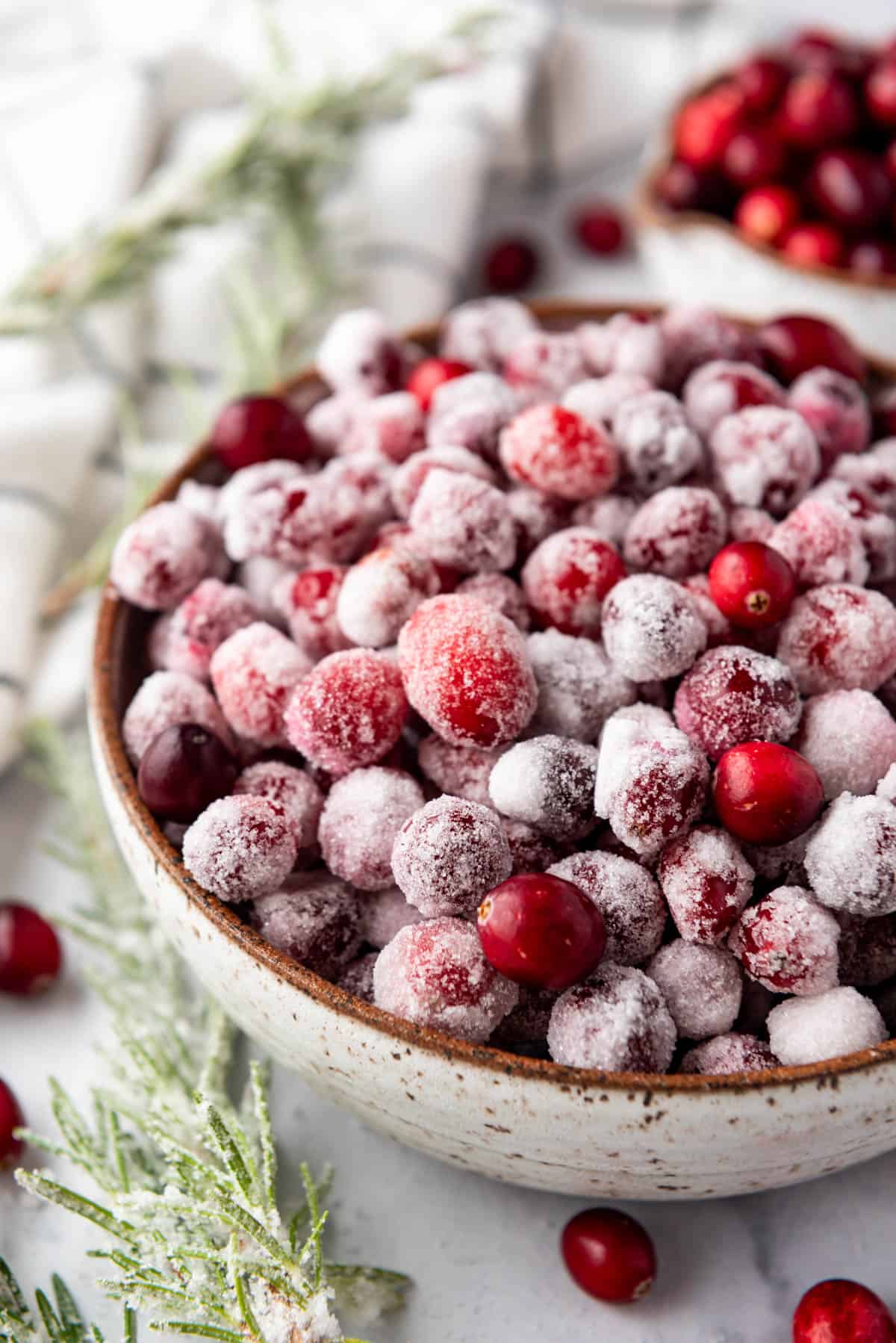 Sugared cranberries in a large bowl.