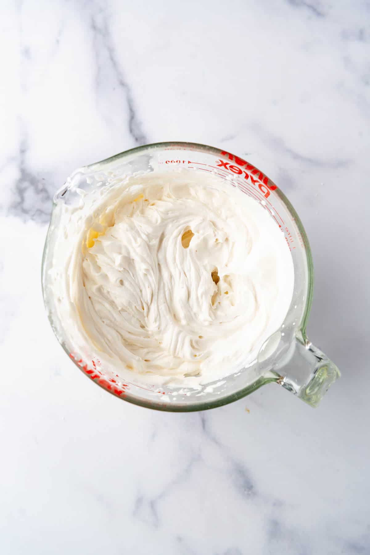 Whipped cream in a bowl.