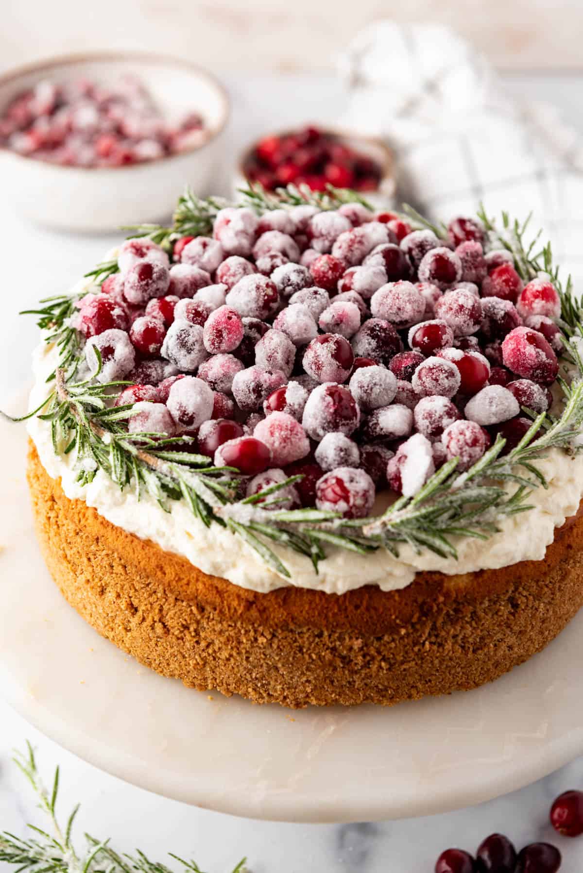 A decorated cranberry cheesecake.