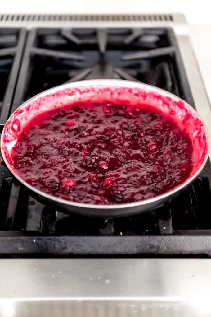 An image of cranberry filling in a pan on the stovetop.