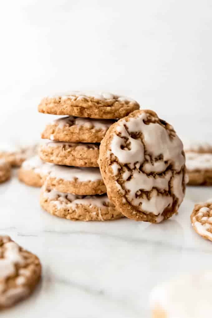 An image of a stack of homemade iced oatmeal cookies.