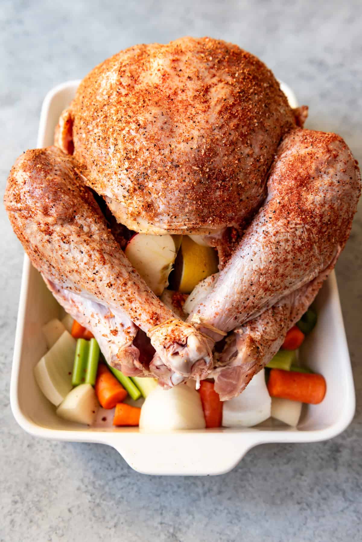 An image of a turkey that is stuffed and trussed for roasting.