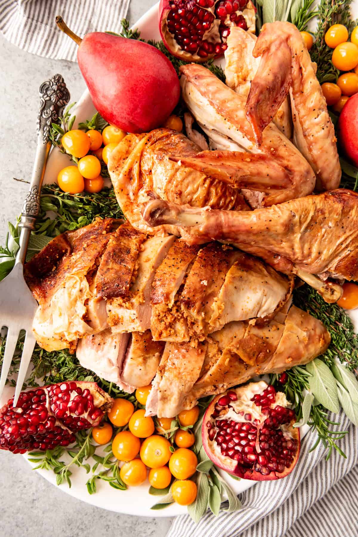 An image of a carved turkey on a serving platter.