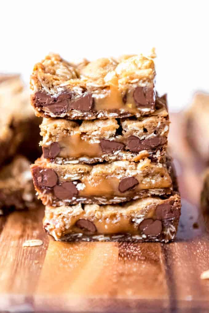 An image of carmelita bars with melted caramel stacked on top of each other.