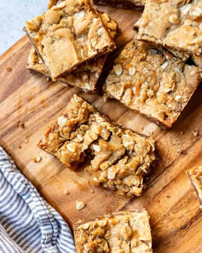 An image of oatmeal cookie bars with caramel and chocolate.