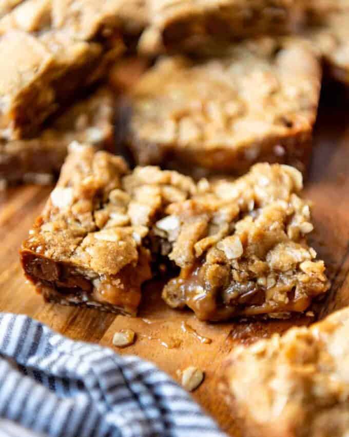 An image of gooey carmelita chocolate, oats, and caramel bars.