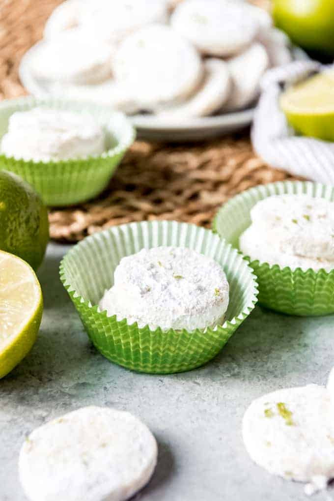 An image of powdered sugar coated lime shortbread cookies.