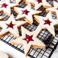 An image of hazelnut and raspberry linzer cookies