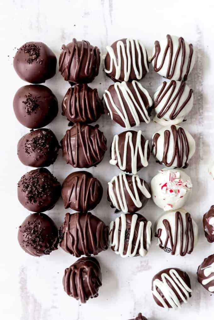 An image of chocolate Oreo balls lined up in rows.