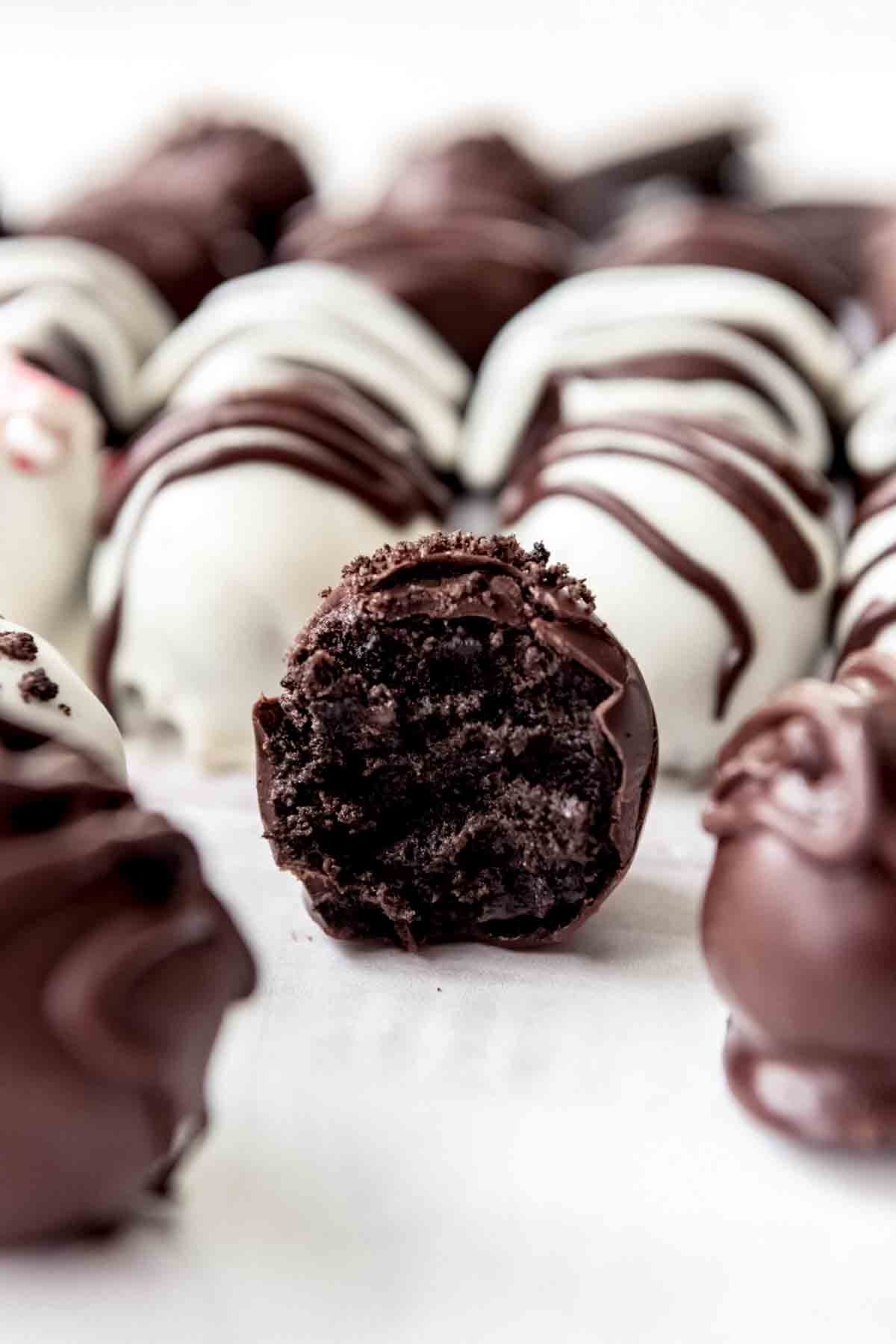 An image of the center of an Oreo ball with a bite taken out of it.