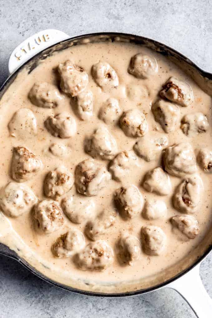 An image of easy Swedish meatballs in a creamy gravy sauce.