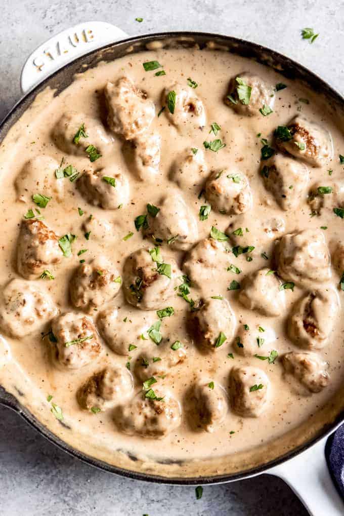 An image of homemade Swedish meatballs in a creamy gravy.