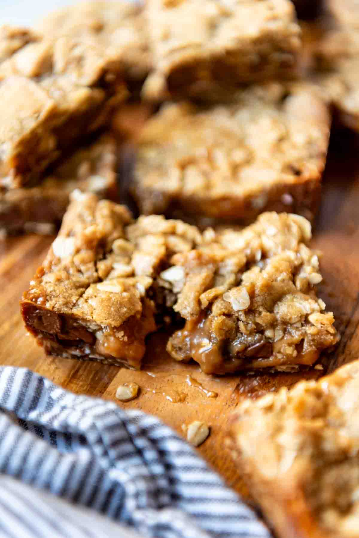 An image of gooey carmelita chocolate, oats, and caramel bars.