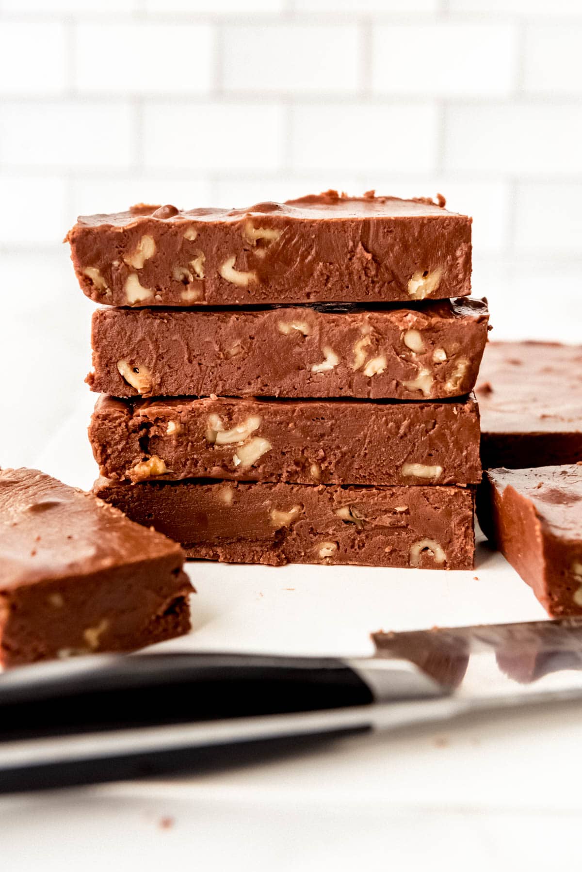 Stacked bars of chocolate walnut fudge.