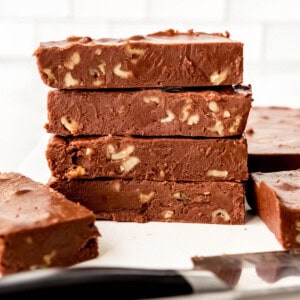 Stacked bars of chocolate walnut fudge.