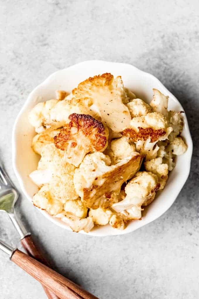 Another image of a bowl full of roasted cauliflower.