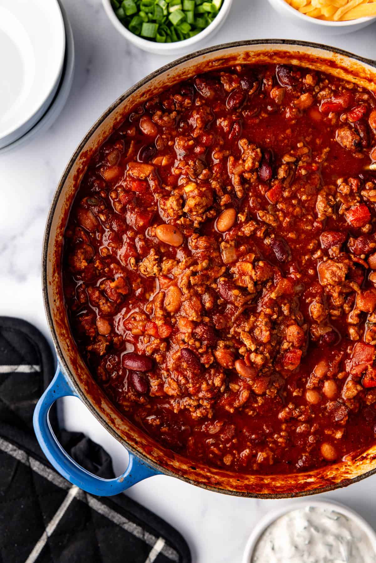 A close up image of a pot of chili.