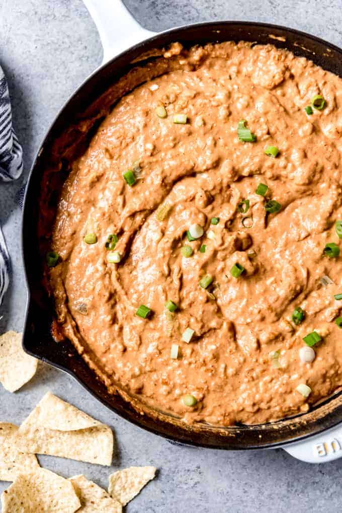 An image of homemade bean dip in a skillet.