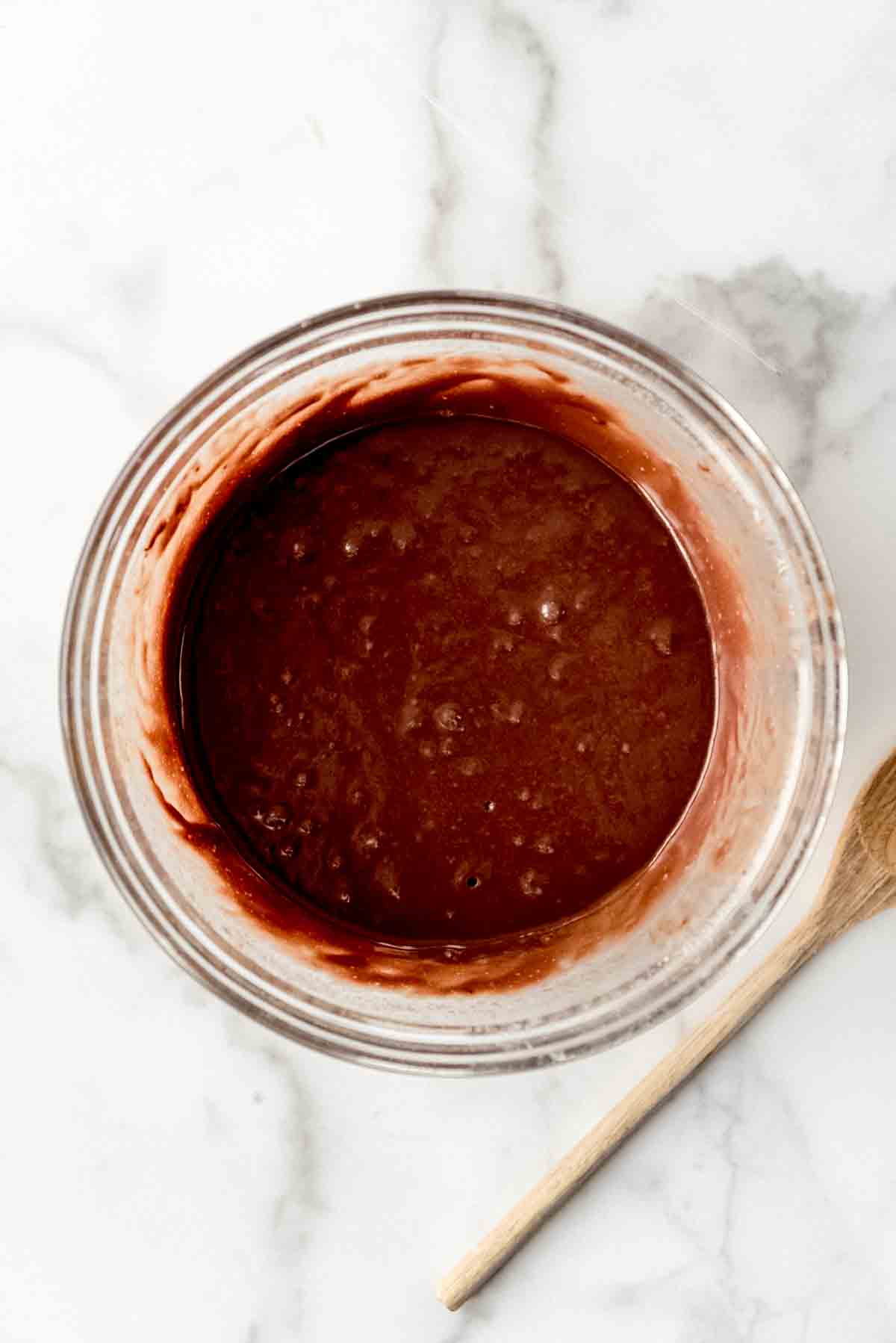 Combined ingredients for Nutella brownies in a bowl.