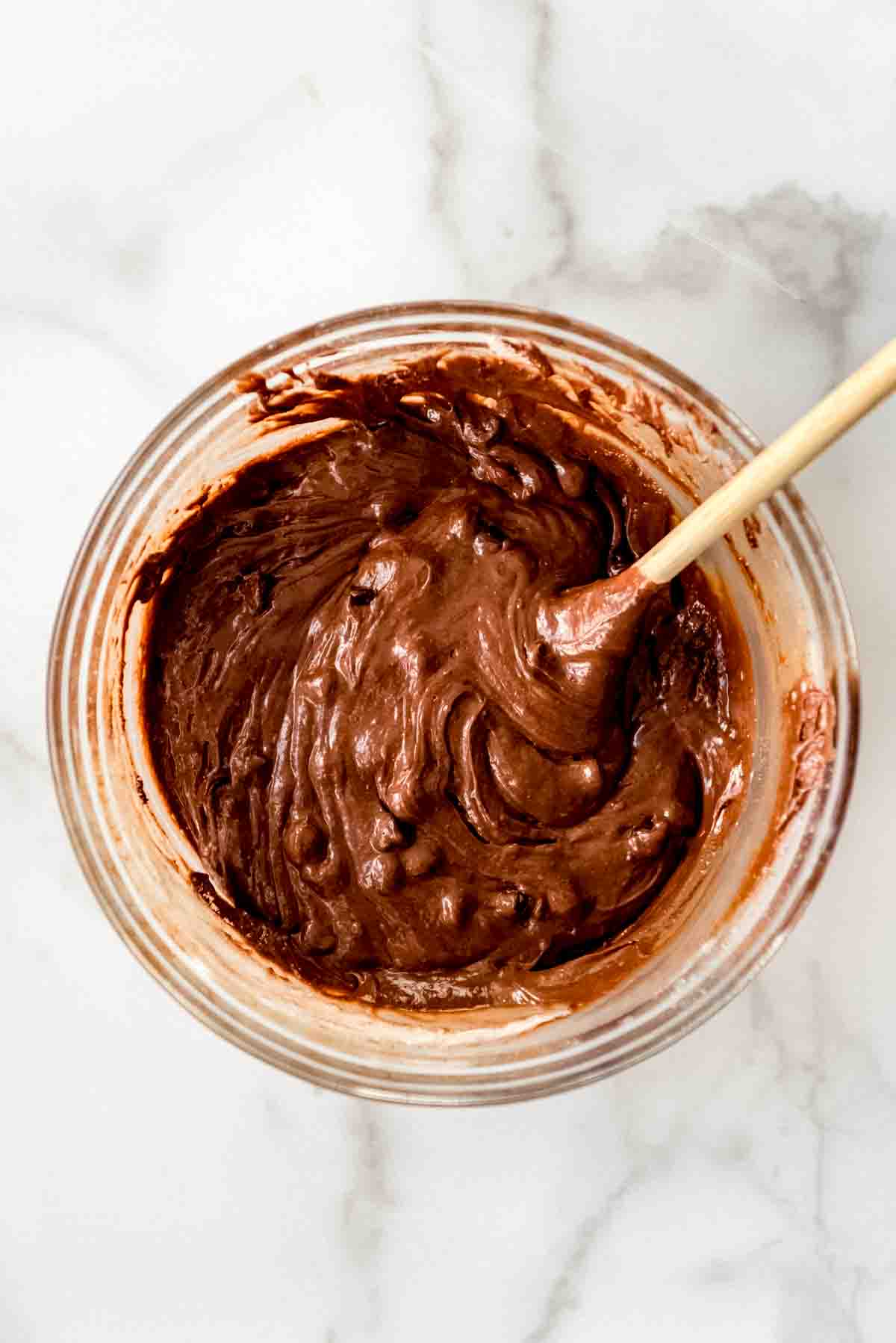 Mixed brownie batter in a bowl.