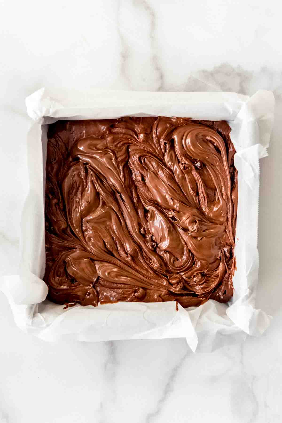 Nutella swirled into the top of brownie batter.