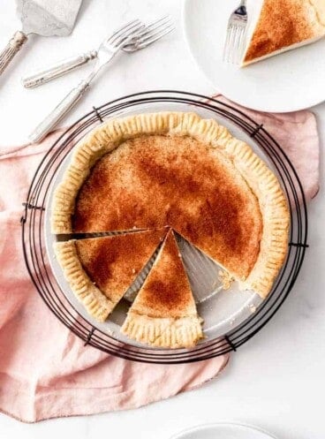 An image of a desperation pie that has been sliced and served on a plate.