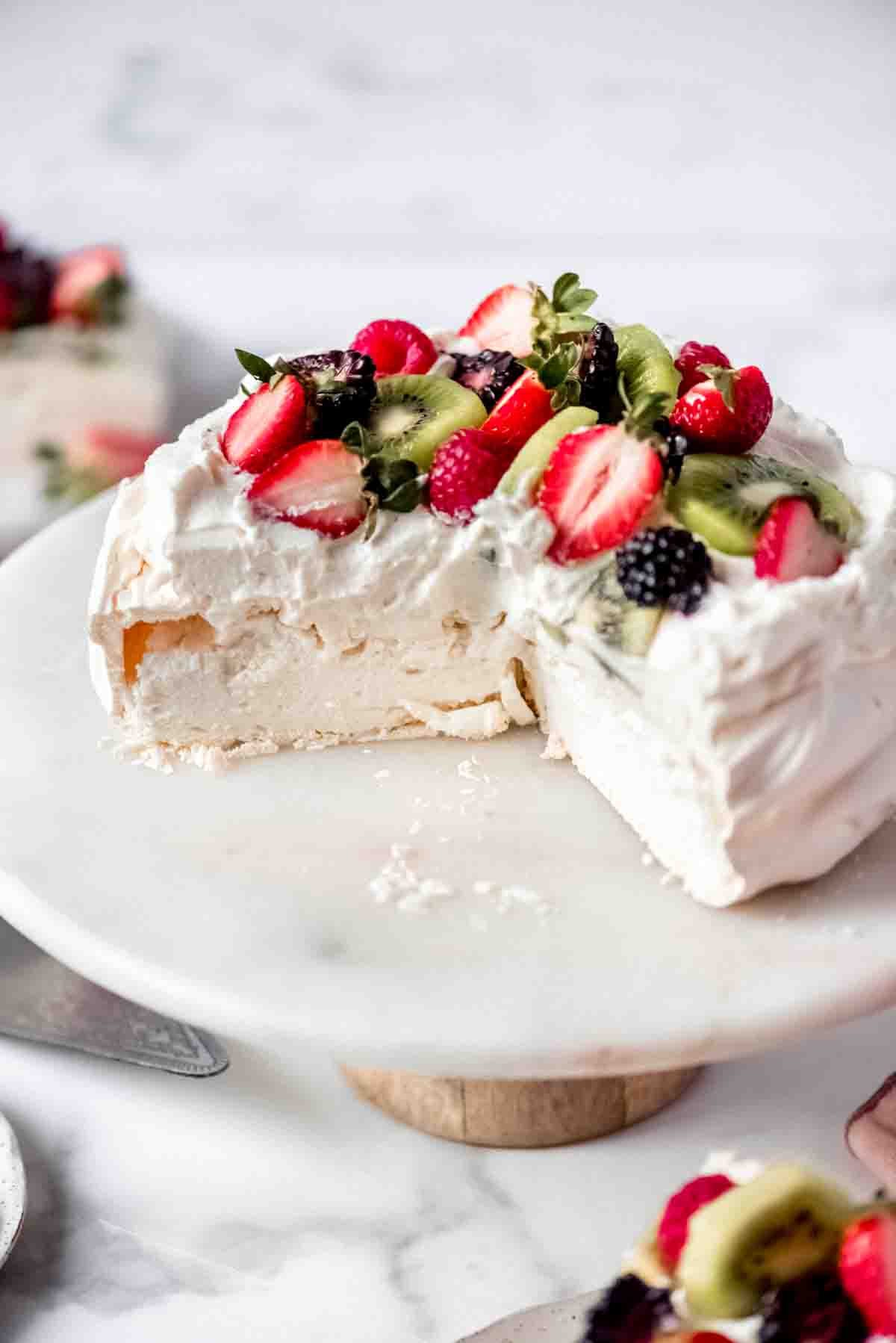 An image showing the fluffy marshmallow-like insides of a pavlova recipe.