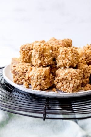 A plate on a wire cooling rack topped with a pile of blarney stones