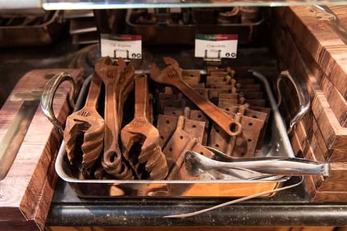 An image of chocolate shaped like wrenches and hinges in Brussels, Belgium.