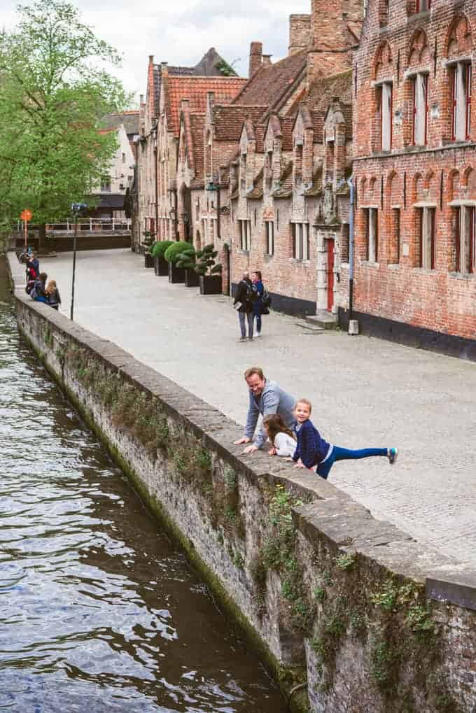 An image of a wall along a canal in Bruges, Belgium.