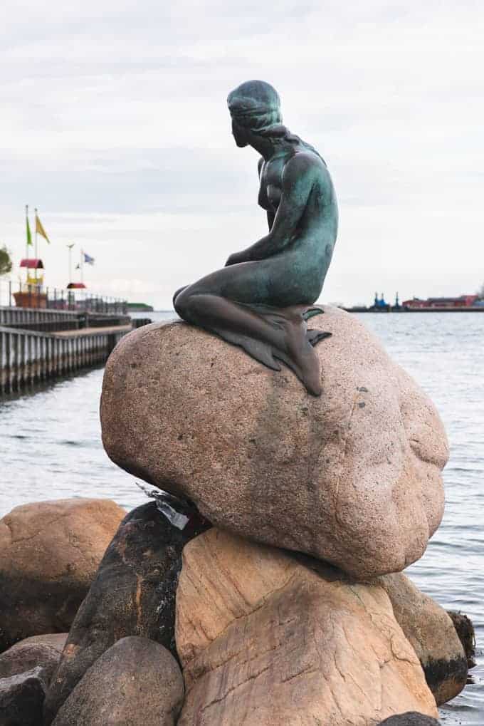 The Little Mermaid statute looking out at the water.