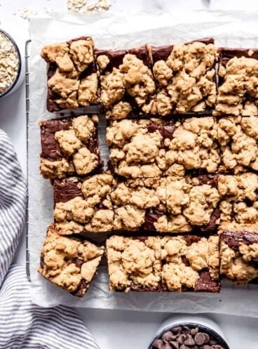 An image of oatmeal fudge bars cut into squares.