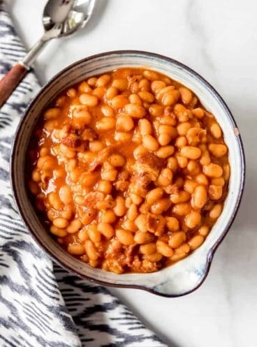 An image of a bowl of homemade pork and beans.