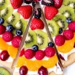 An image of a slice of easy fresh fruit pizza.