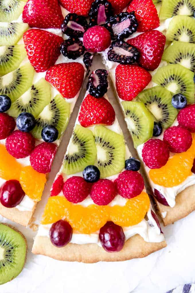 An image of a slice of easy fresh fruit pizza.