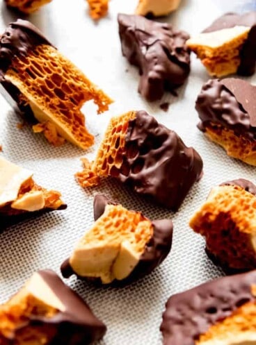 An image of honeycomb candy coated in chocolate.