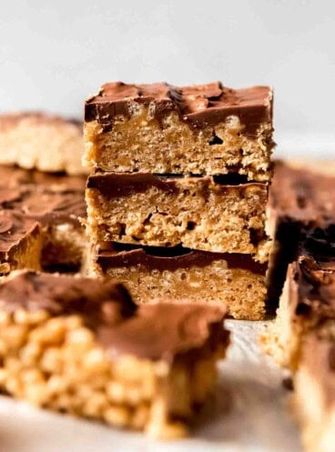 An image of a stack of peanut butter chocolate rice krispie treats.