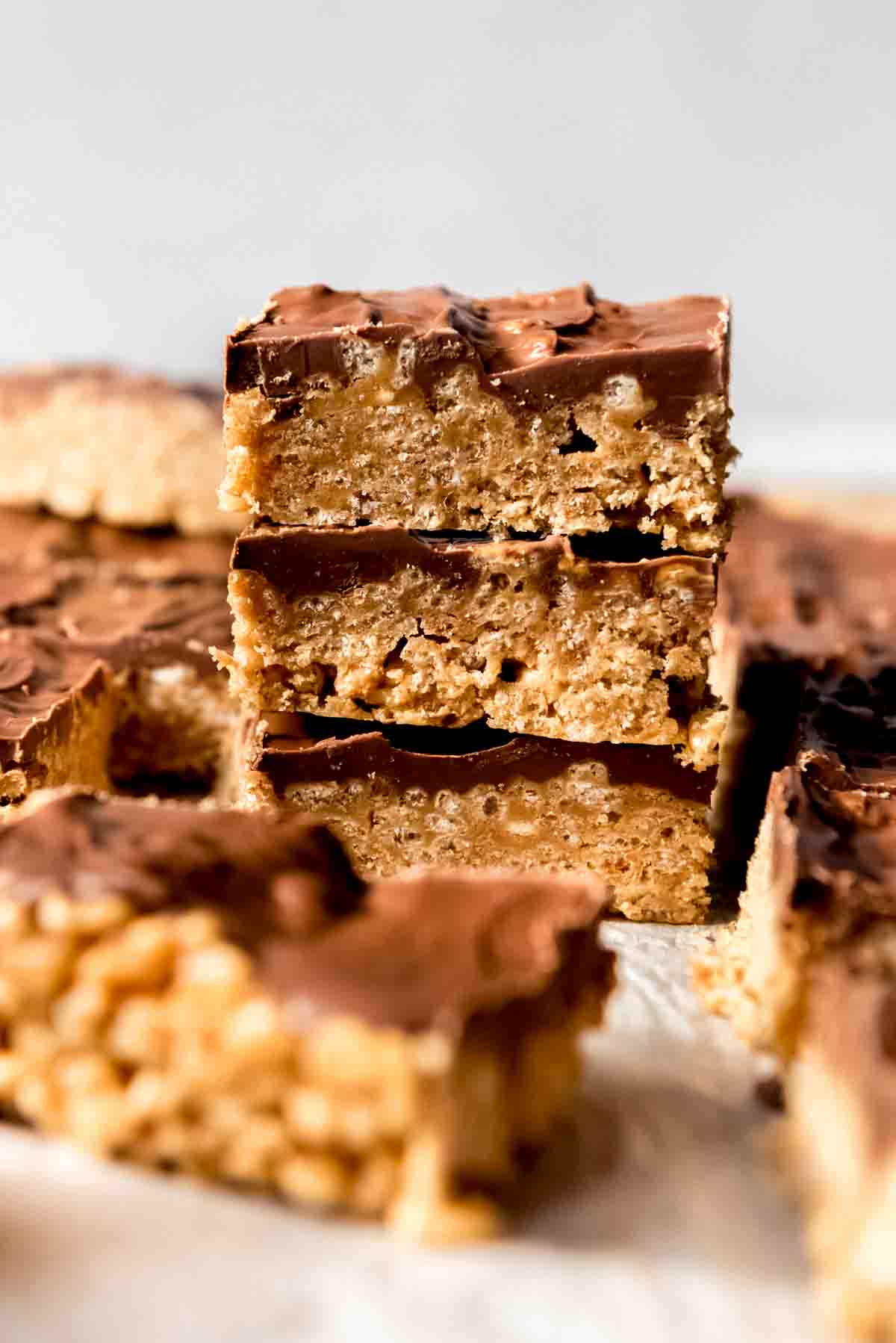 An image of a stack of peanut butter chocolate rice krispie treats.