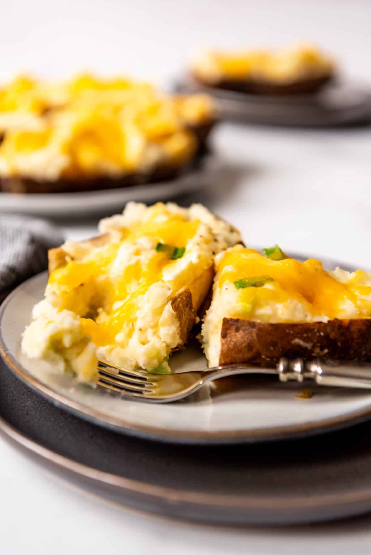 An image of cheesy twice baked potatoes.