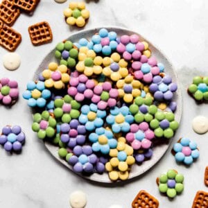 An image of an easy Easter treat for kids to make at home with pretzels, white chocolate, and M&M's.