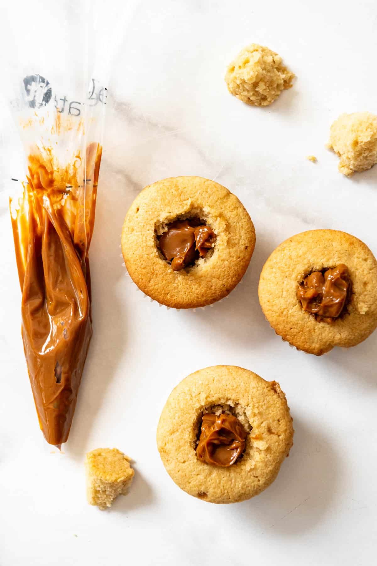 Cupcakes with the centers removed and filled with dulce de leche instead.