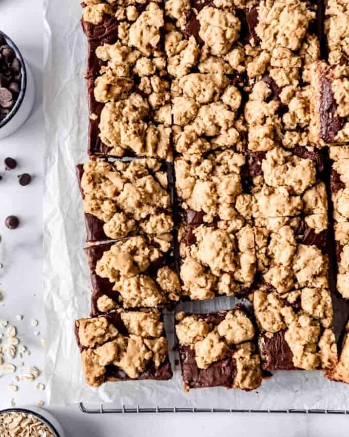 An image of easy oatmeal cookie bars on a wire cooling rack.