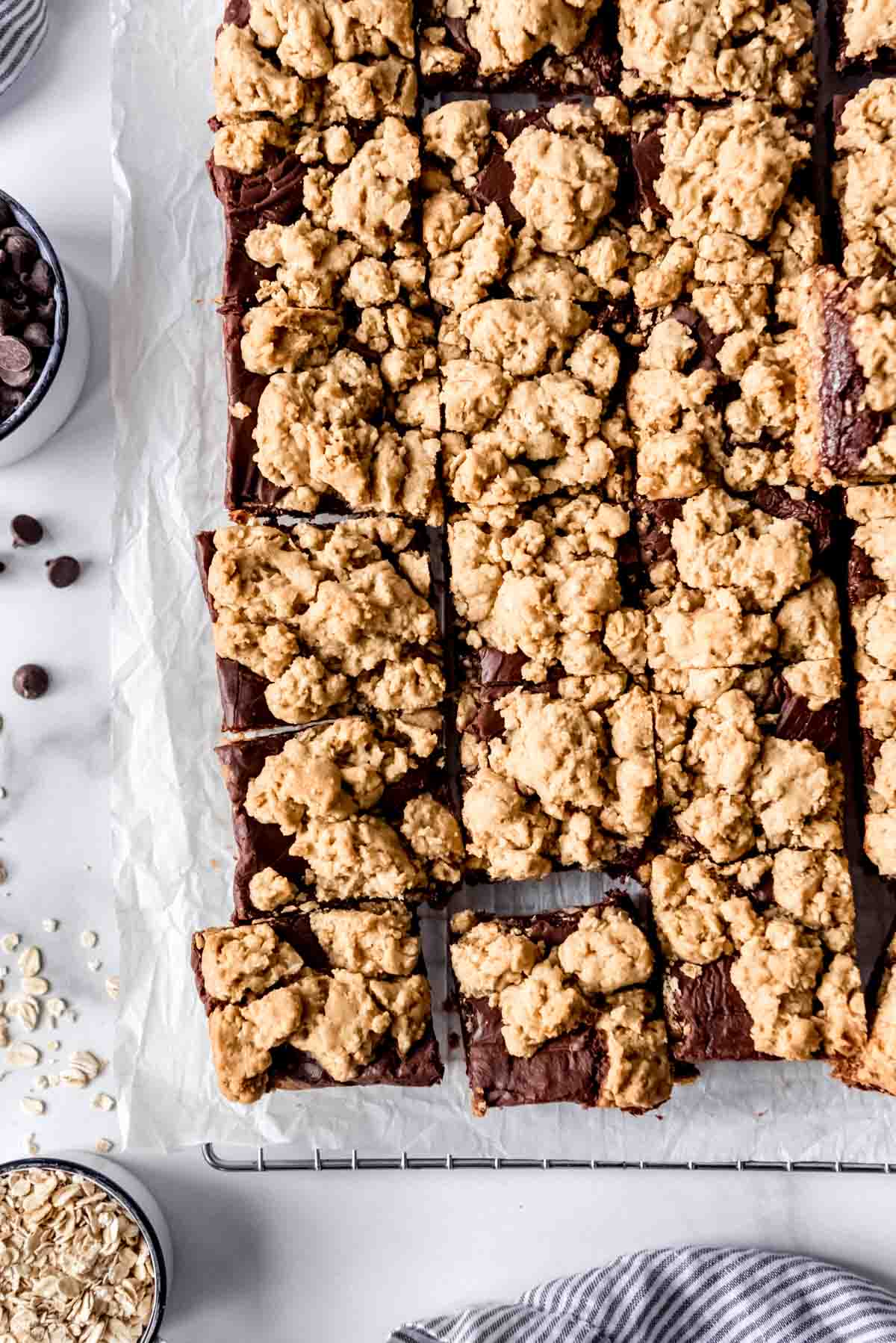 An image of easy oatmeal cookie bars on a wire cooling rack.