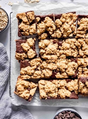 An image of oatmeal fudge bars cut into squares.